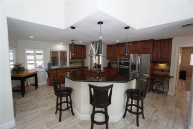 This home is 2211 sq. ft. that has been remodeled inside from on Twin Isles Country Club in Florida - for sale on GolfHomes.com, golf home, golf lot