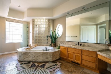 Beautiful single level home located adjacent to the second hole on Genoa Lakes Golf Club - Lakes Course in Nevada - for sale on GolfHomes.com, golf home, golf lot