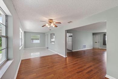 Charming Canal Front 2-Bed, 2-Bath Home with Stunning Upgrades! on Leisureville Community Golf Course in Florida - for sale on GolfHomes.com, golf home, golf lot