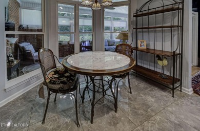 This custom all brick home in the heart of Tellico Village is on Tanasi Golf Course in Tennessee - for sale on GolfHomes.com, golf home, golf lot