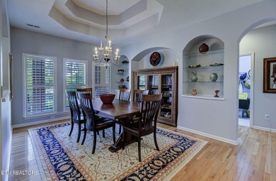 This custom all brick home in the heart of Tellico Village is on Tanasi Golf Course in Tennessee - for sale on GolfHomes.com, golf home, golf lot