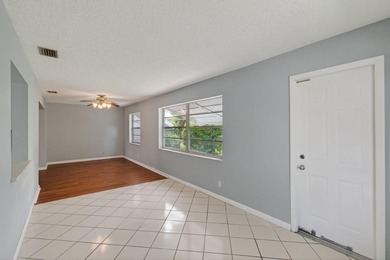 Charming Canal Front 2-Bed, 2-Bath Home with Stunning Upgrades! on Leisureville Community Golf Course in Florida - for sale on GolfHomes.com, golf home, golf lot