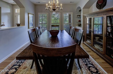 This custom all brick home in the heart of Tellico Village is on Tanasi Golf Course in Tennessee - for sale on GolfHomes.com, golf home, golf lot