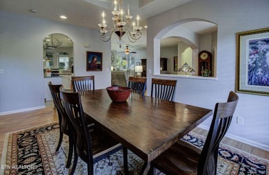 This custom all brick home in the heart of Tellico Village is on Tanasi Golf Course in Tennessee - for sale on GolfHomes.com, golf home, golf lot