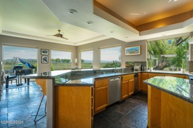 Beautiful single level home located adjacent to the second hole on Genoa Lakes Golf Club - Lakes Course in Nevada - for sale on GolfHomes.com, golf home, golf lot