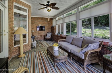 This custom all brick home in the heart of Tellico Village is on Tanasi Golf Course in Tennessee - for sale on GolfHomes.com, golf home, golf lot
