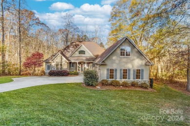 This stunning residence boasts 4 spacious bedrooms and 3.5 baths on Cleveland Country Club  in North Carolina - for sale on GolfHomes.com, golf home, golf lot