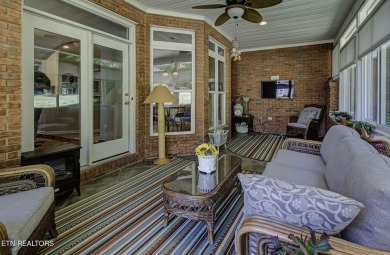 This custom all brick home in the heart of Tellico Village is on Tanasi Golf Course in Tennessee - for sale on GolfHomes.com, golf home, golf lot