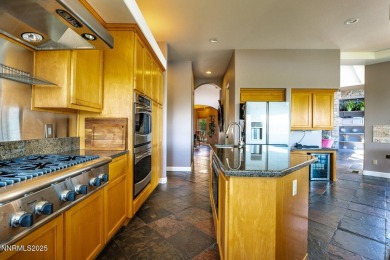 Beautiful single level home located adjacent to the second hole on Genoa Lakes Golf Club - Lakes Course in Nevada - for sale on GolfHomes.com, golf home, golf lot
