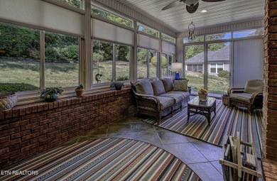 This custom all brick home in the heart of Tellico Village is on Tanasi Golf Course in Tennessee - for sale on GolfHomes.com, golf home, golf lot