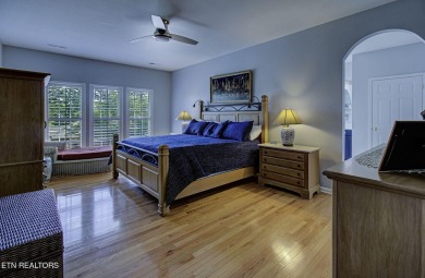 This custom all brick home in the heart of Tellico Village is on Tanasi Golf Course in Tennessee - for sale on GolfHomes.com, golf home, golf lot