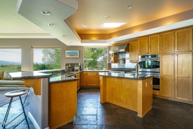 Beautiful single level home located adjacent to the second hole on Genoa Lakes Golf Club - Lakes Course in Nevada - for sale on GolfHomes.com, golf home, golf lot
