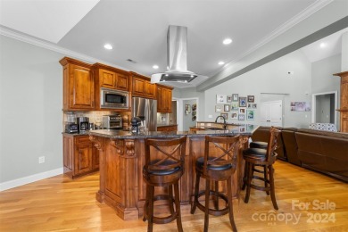 This stunning residence boasts 4 spacious bedrooms and 3.5 baths on Cleveland Country Club  in North Carolina - for sale on GolfHomes.com, golf home, golf lot