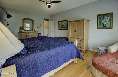 This custom all brick home in the heart of Tellico Village is on Tanasi Golf Course in Tennessee - for sale on GolfHomes.com, golf home, golf lot