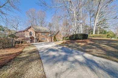 This custom brick home is an entertainer's dream with a private on Dunwoody Country Club in Georgia - for sale on GolfHomes.com, golf home, golf lot