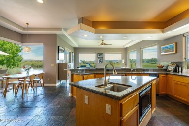 Beautiful single level home located adjacent to the second hole on Genoa Lakes Golf Club - Lakes Course in Nevada - for sale on GolfHomes.com, golf home, golf lot