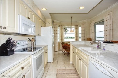 It's all about the views! This 2nd-floor Brookside condo on Heritage Palms Golf and Country Club in Florida - for sale on GolfHomes.com, golf home, golf lot
