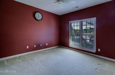 This custom all brick home in the heart of Tellico Village is on Tanasi Golf Course in Tennessee - for sale on GolfHomes.com, golf home, golf lot