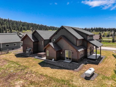 This 3,260 sq ft 4-bedroom, 2.5-bathroom home with a bonus room on McCall Municipal Golf Course in Idaho - for sale on GolfHomes.com, golf home, golf lot