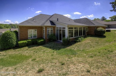 This custom all brick home in the heart of Tellico Village is on Tanasi Golf Course in Tennessee - for sale on GolfHomes.com, golf home, golf lot