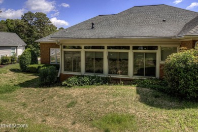 This custom all brick home in the heart of Tellico Village is on Tanasi Golf Course in Tennessee - for sale on GolfHomes.com, golf home, golf lot
