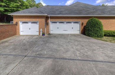 This custom all brick home in the heart of Tellico Village is on Tanasi Golf Course in Tennessee - for sale on GolfHomes.com, golf home, golf lot