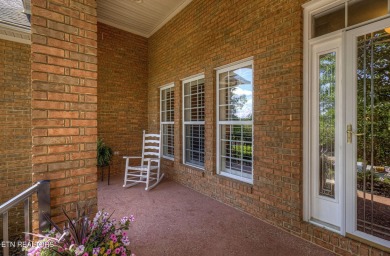 This custom all brick home in the heart of Tellico Village is on Tanasi Golf Course in Tennessee - for sale on GolfHomes.com, golf home, golf lot