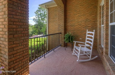 This custom all brick home in the heart of Tellico Village is on Tanasi Golf Course in Tennessee - for sale on GolfHomes.com, golf home, golf lot