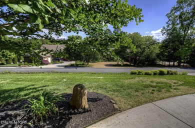 This custom all brick home in the heart of Tellico Village is on Tanasi Golf Course in Tennessee - for sale on GolfHomes.com, golf home, golf lot