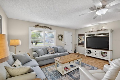 OVERLOOK PRIVATE, WOODED, VIEWS in this FANTASTIC, TURNKEY 2/2 on El Diablo Executive Golf Course in Florida - for sale on GolfHomes.com, golf home, golf lot