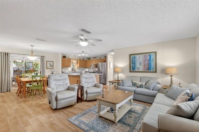 OVERLOOK PRIVATE, WOODED, VIEWS in this FANTASTIC, TURNKEY 2/2 on El Diablo Executive Golf Course in Florida - for sale on GolfHomes.com, golf home, golf lot