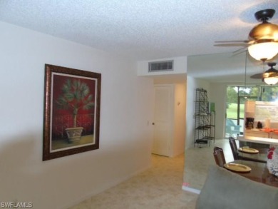 This 55-year and older condominium WITH ONE BEDROOM is 751 Sq on Golden Gate Country Club in Florida - for sale on GolfHomes.com, golf home, golf lot