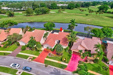 Exquisite newly renovated centrally located home with incredible on Boca Greens Country Club in Florida - for sale on GolfHomes.com, golf home, golf lot