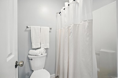 Discover your perfect coastal escape in this wonderful, fully on Surf Golf and Beach Club in South Carolina - for sale on GolfHomes.com, golf home, golf lot