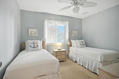 Discover your perfect coastal escape in this wonderful, fully on Surf Golf and Beach Club in South Carolina - for sale on GolfHomes.com, golf home, golf lot