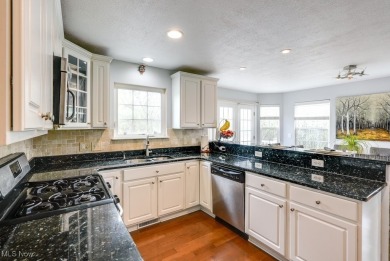 Discover this well-maintained 4 bed, 2 full/2 half bath colonial on Boulder Creek Golf Club in Ohio - for sale on GolfHomes.com, golf home, golf lot