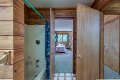 CHARMING YEAR-ROUND HOME ON 3.74 ACRES OVERLOOKING THE THOUSAND on The Thousand Island Country Club in New York - for sale on GolfHomes.com, golf home, golf lot