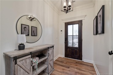 This beautifully designed Discovery Built one-story home offers on Champions Pointe Golf Course in Indiana - for sale on GolfHomes.com, golf home, golf lot