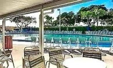 Stunning ground-floor unit with garden views! Over $50,000 in on Kings Point Golf - Executive in Florida - for sale on GolfHomes.com, golf home, golf lot