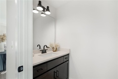 Discover modern, low-maintenance luxury living in this stunning on The Golf Club of Kansas in Kansas - for sale on GolfHomes.com, golf home, golf lot