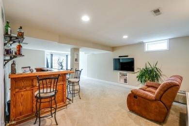 Discover this well-maintained 4 bed, 2 full/2 half bath colonial on Boulder Creek Golf Club in Ohio - for sale on GolfHomes.com, golf home, golf lot
