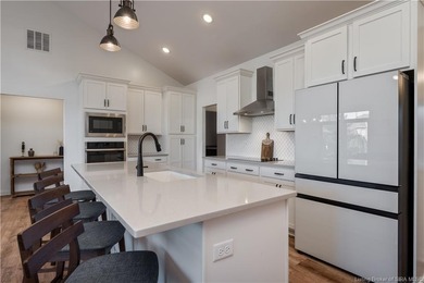 This beautifully designed Discovery Built one-story home offers on Champions Pointe Golf Course in Indiana - for sale on GolfHomes.com, golf home, golf lot