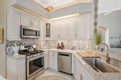 Live the dream in this gorgeous 2 bedroom, 2 bath, plus den on Rosedale Golf and Tennis Club in Florida - for sale on GolfHomes.com, golf home, golf lot