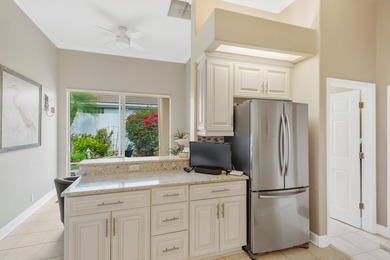 Live the dream in this gorgeous 2 bedroom, 2 bath, plus den on Rosedale Golf and Tennis Club in Florida - for sale on GolfHomes.com, golf home, golf lot