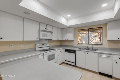 Take in peaceful golf course views from this inviting 2 bedroom on Sugar Mill Country Club in Florida - for sale on GolfHomes.com, golf home, golf lot