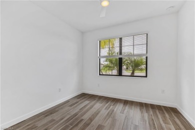 Experience the beauty of living on a golf course in this on Valencia Golf and Country Club in Florida - for sale on GolfHomes.com, golf home, golf lot