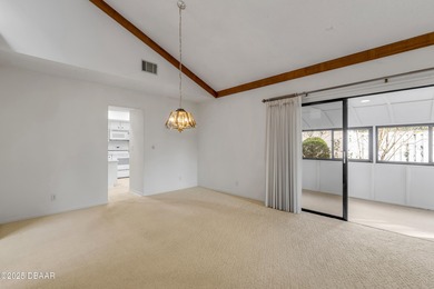 Take in peaceful golf course views from this inviting 2 bedroom on Sugar Mill Country Club in Florida - for sale on GolfHomes.com, golf home, golf lot