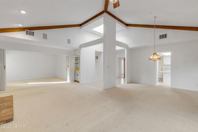 Take in peaceful golf course views from this inviting 2 bedroom on Sugar Mill Country Club in Florida - for sale on GolfHomes.com, golf home, golf lot