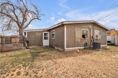 This 3-bedroom, 1-bath home plus a bonus room is a great on Comanche Trail Golf Course in Texas - for sale on GolfHomes.com, golf home, golf lot