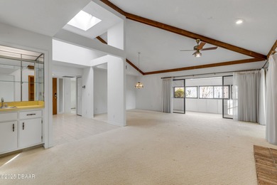 Take in peaceful golf course views from this inviting 2 bedroom on Sugar Mill Country Club in Florida - for sale on GolfHomes.com, golf home, golf lot